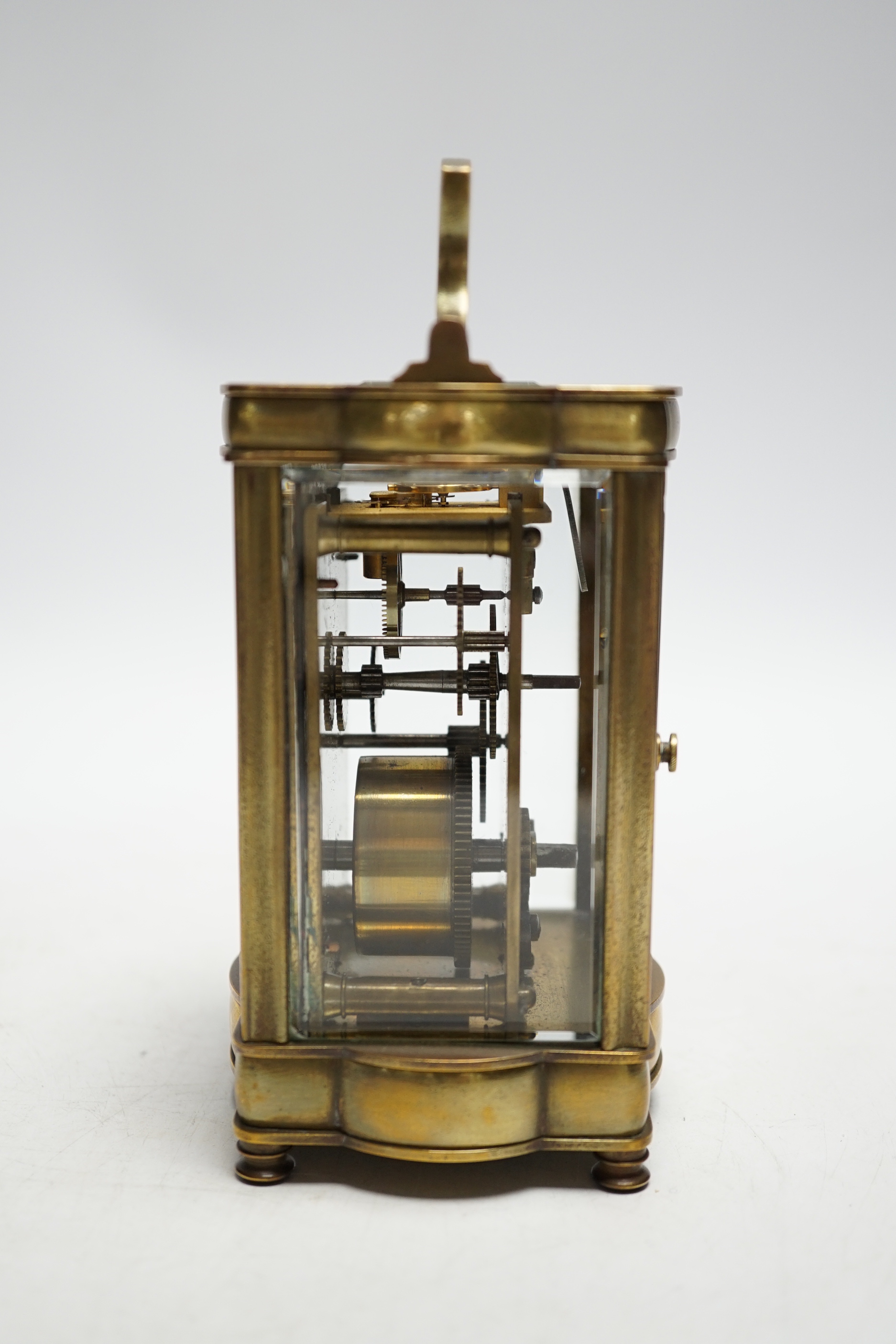 A brass cased carriage timepiece, 12cm